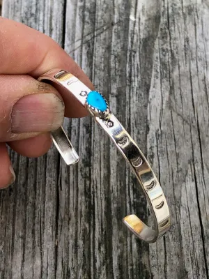 Navajo turquoise and silver stamped bracelet