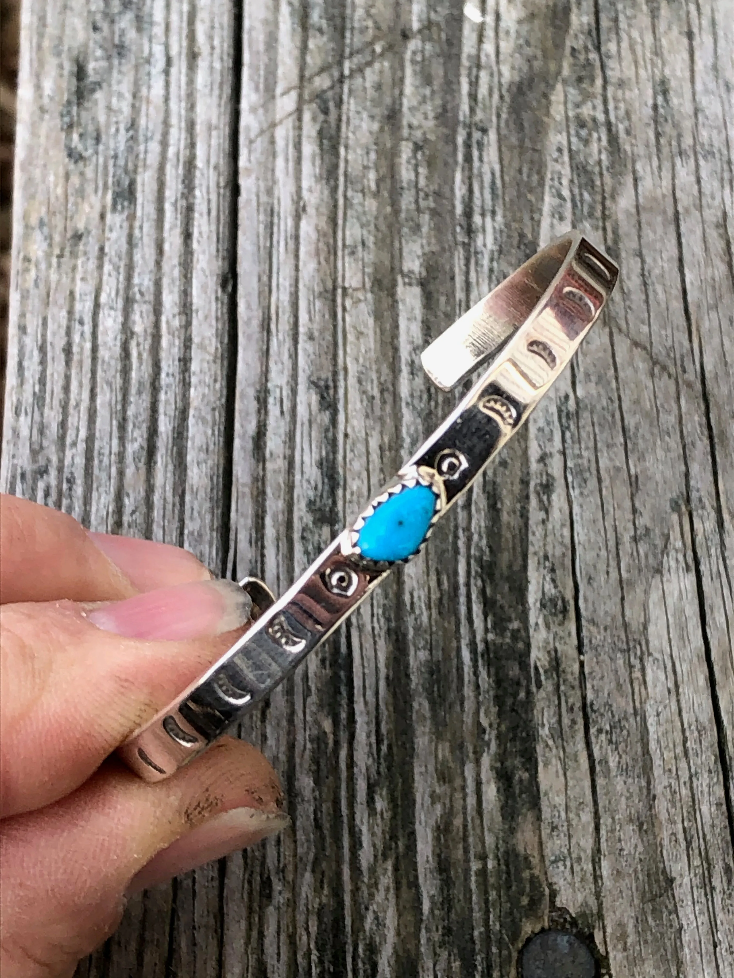 Navajo turquoise and silver stamped bracelet