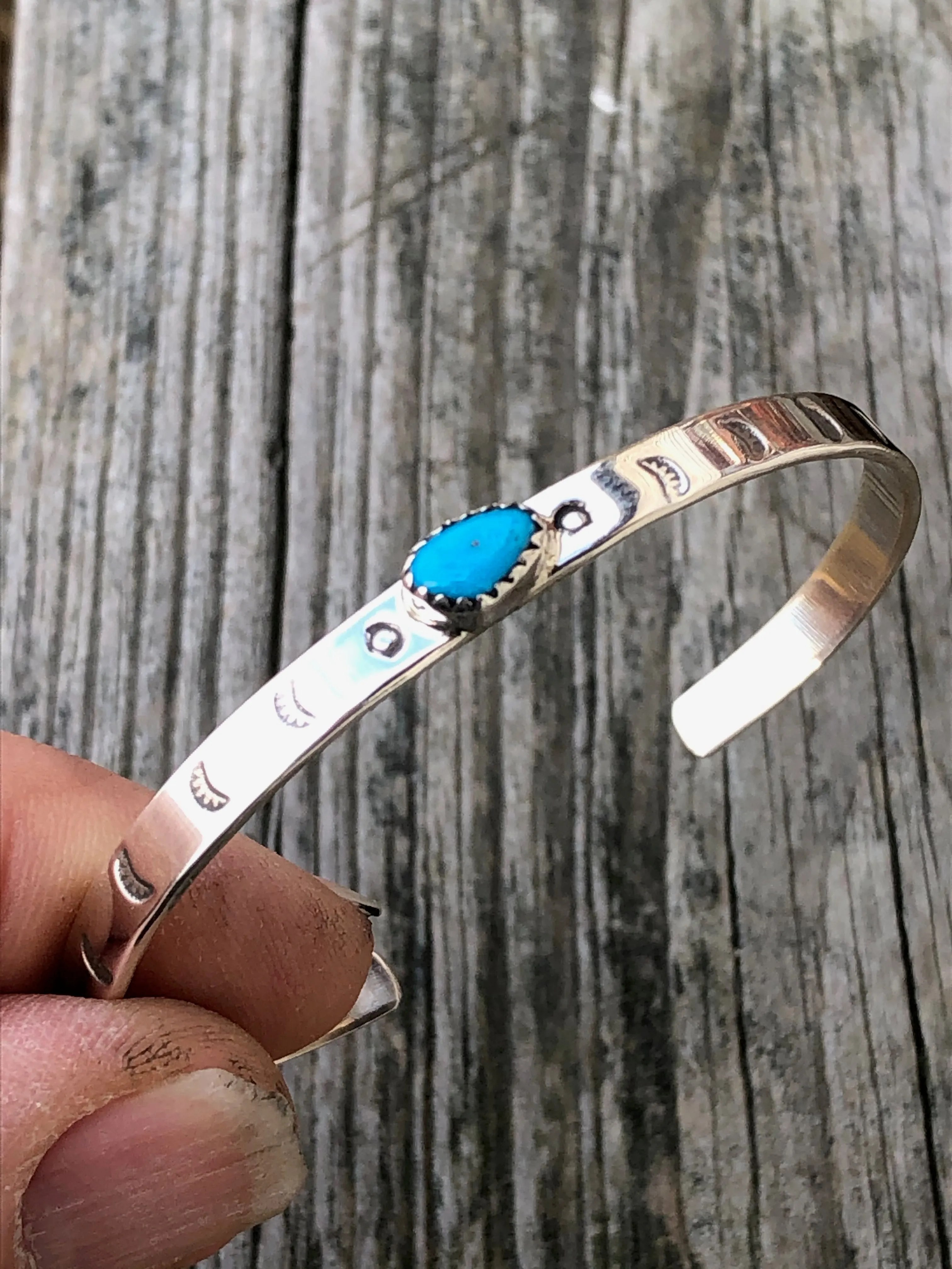 Navajo turquoise and silver stamped bracelet