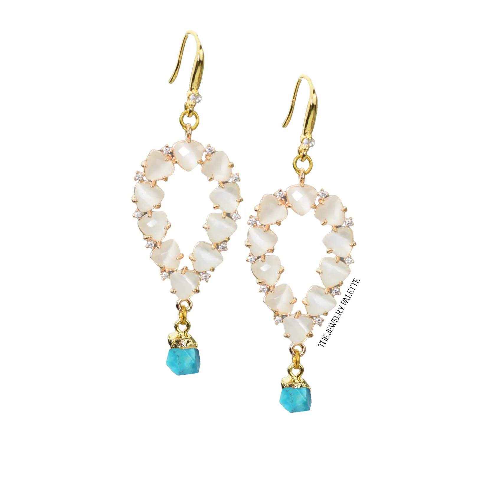 Yara white stones with gold edged emerald drop earrings