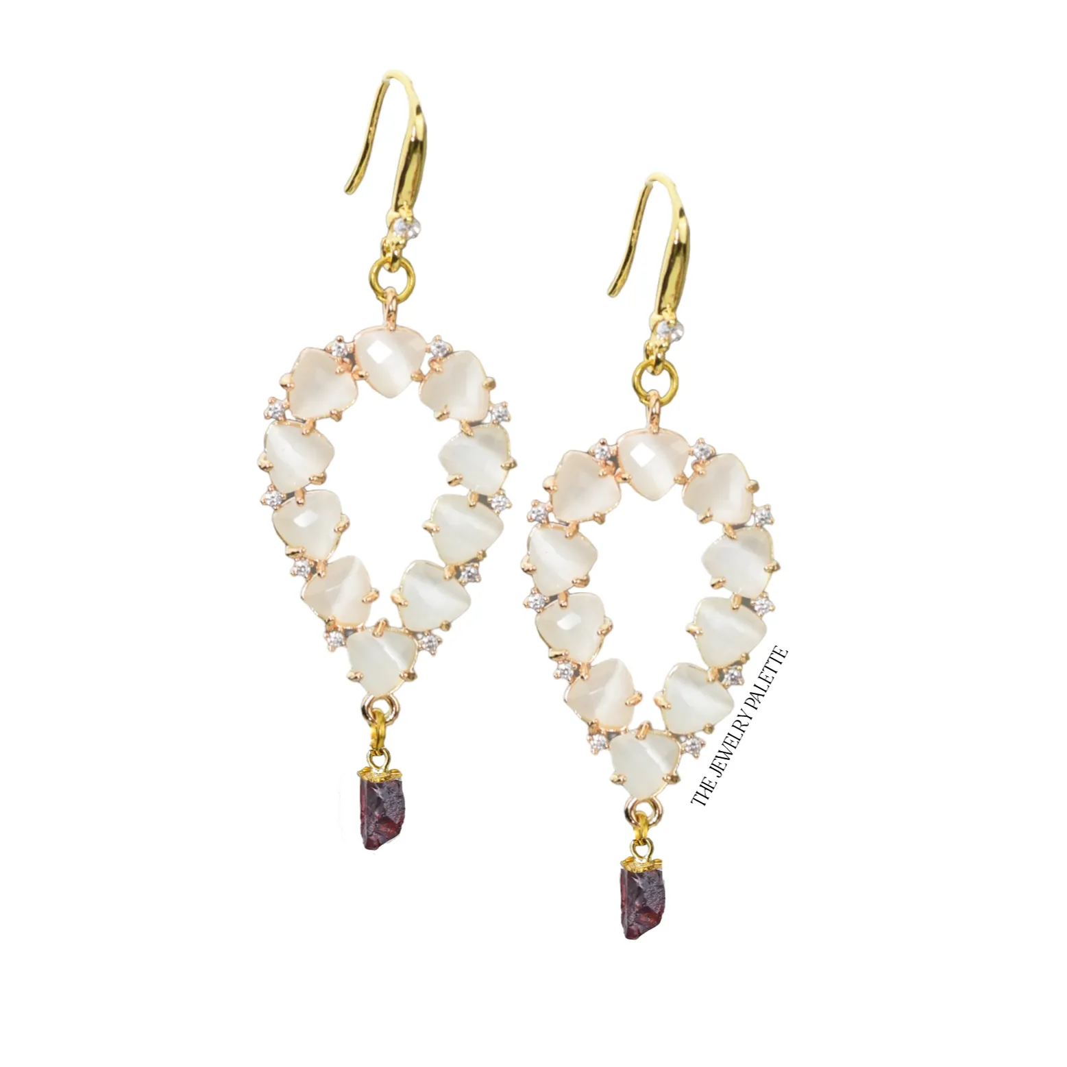 Yara white stones with gold edged emerald drop earrings